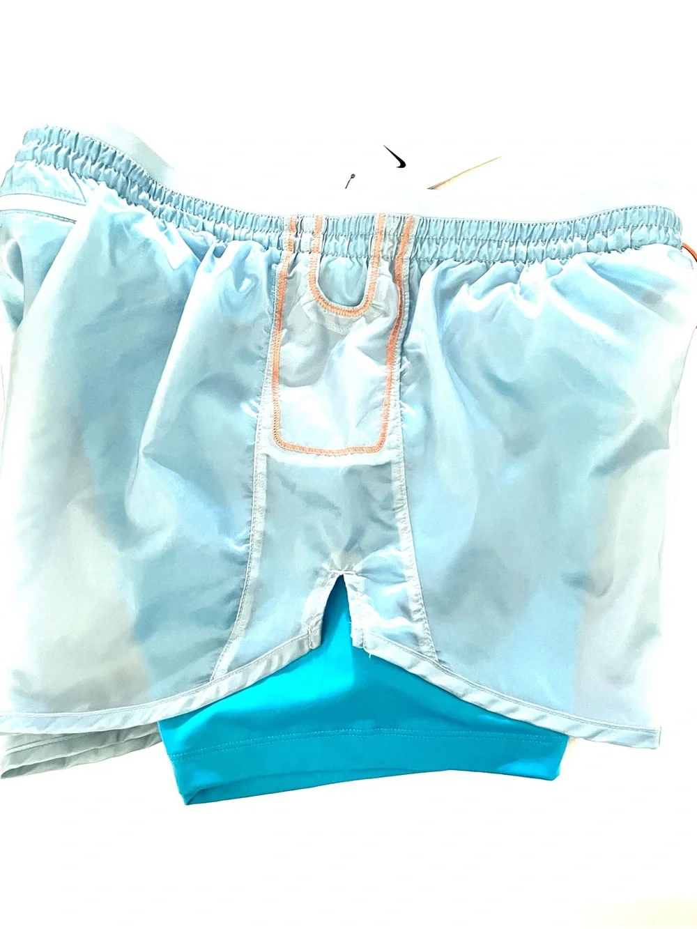 Nike Light Blue Women's Athletic Shorts with Orange Drawstring